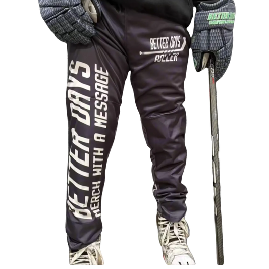 Al Demauro Better Days neutral inline hockey pants with padding, adjustable straps, and reinforced design for roller hockey performance.